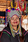 Woman of the Akha tribe poses with her traditionnal haiddress at her village near Chiang Rai, northern Thailand. 